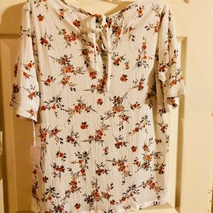Woman’s Juniors Ruffle Sleeves White Floral Top